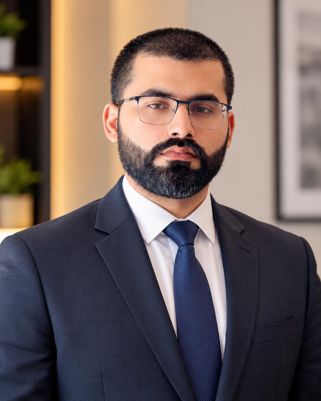 Professional portrait of Engr. Qasim Zia Aulakh